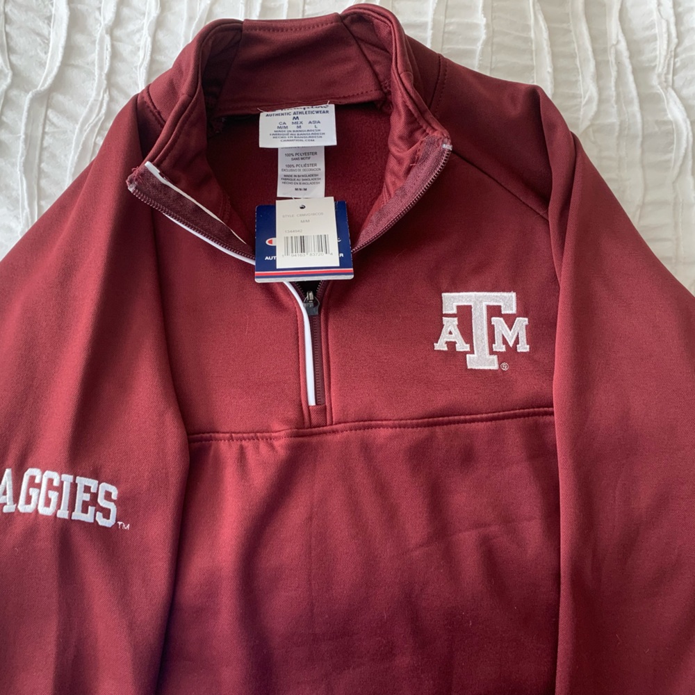 Howdy! Brand new with tags on Texas A&M quarter zip pullover.